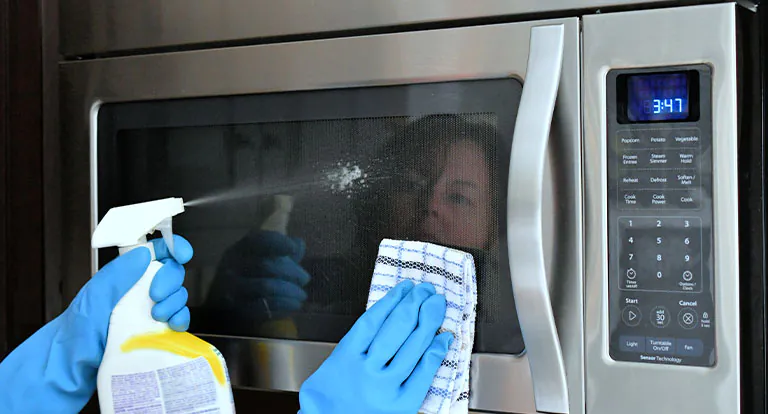 doing-housework-chores-by-cleaning-the-microwave doing-housework-chores-by-cleaning-the-microwave