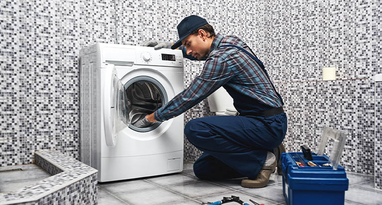 washing-mashine-is-leaked-working-man-plumber-rep